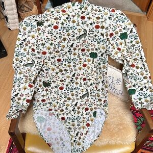 Samantha Pleet Illuminated off white turtle bodysuit.